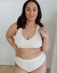 Here we have our Model displaying our cream everyday crop bra XL set