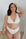 MODELLING A CREAM SET PLUNGE BRA + THONG FOR COMFORT