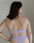 BACK VIEW OF LILAC BRA AND THONG SET