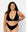 Our confident model is showcasing our always ordered Plunge bra set in midnight black matching this up with a black thong