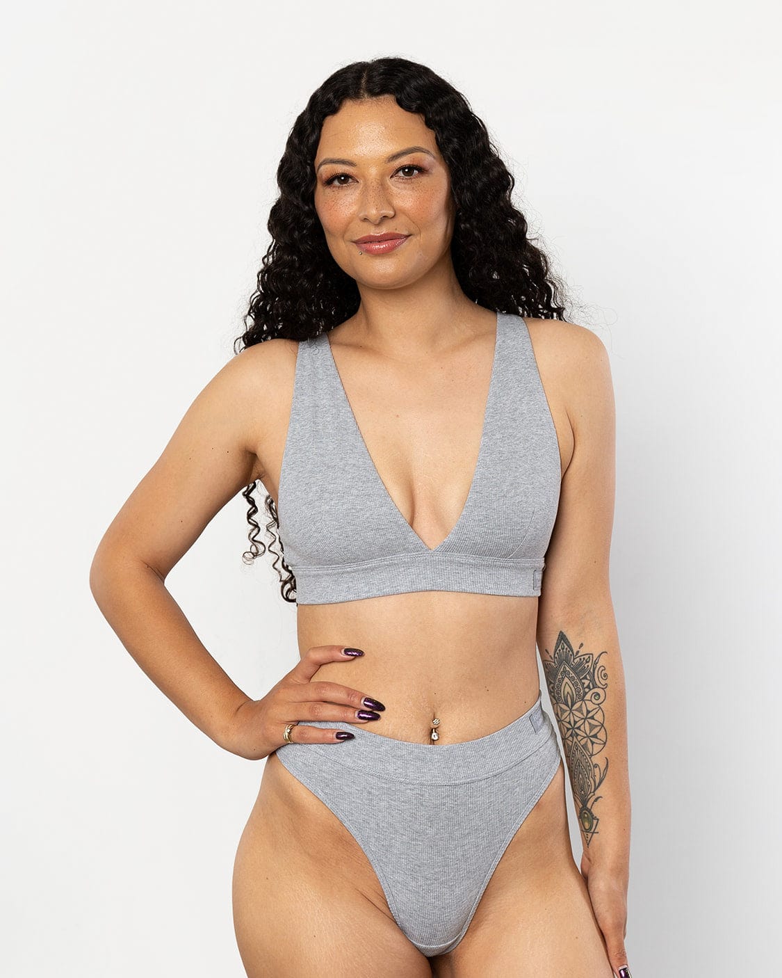 Modelled beautifully is our popular Scoop neck bra that is marle grey in colour alongside our matching thong