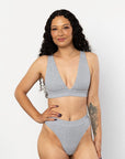 Modelled beautifully is our popular Scoop neck bra that is marle grey in colour alongside our matching thong