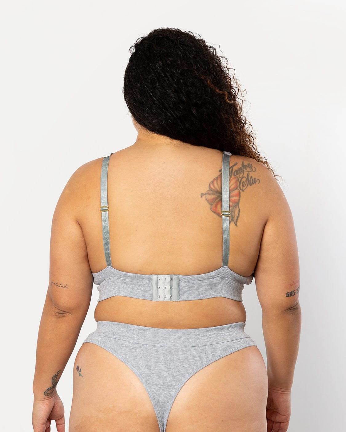 This is a back view of our popular Scoop neck bra marle grey set  combined with the comfortable thong of the same colour