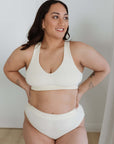 CREAM EVERYDAY CROP BRA MODELLED BEAUTIFULLY