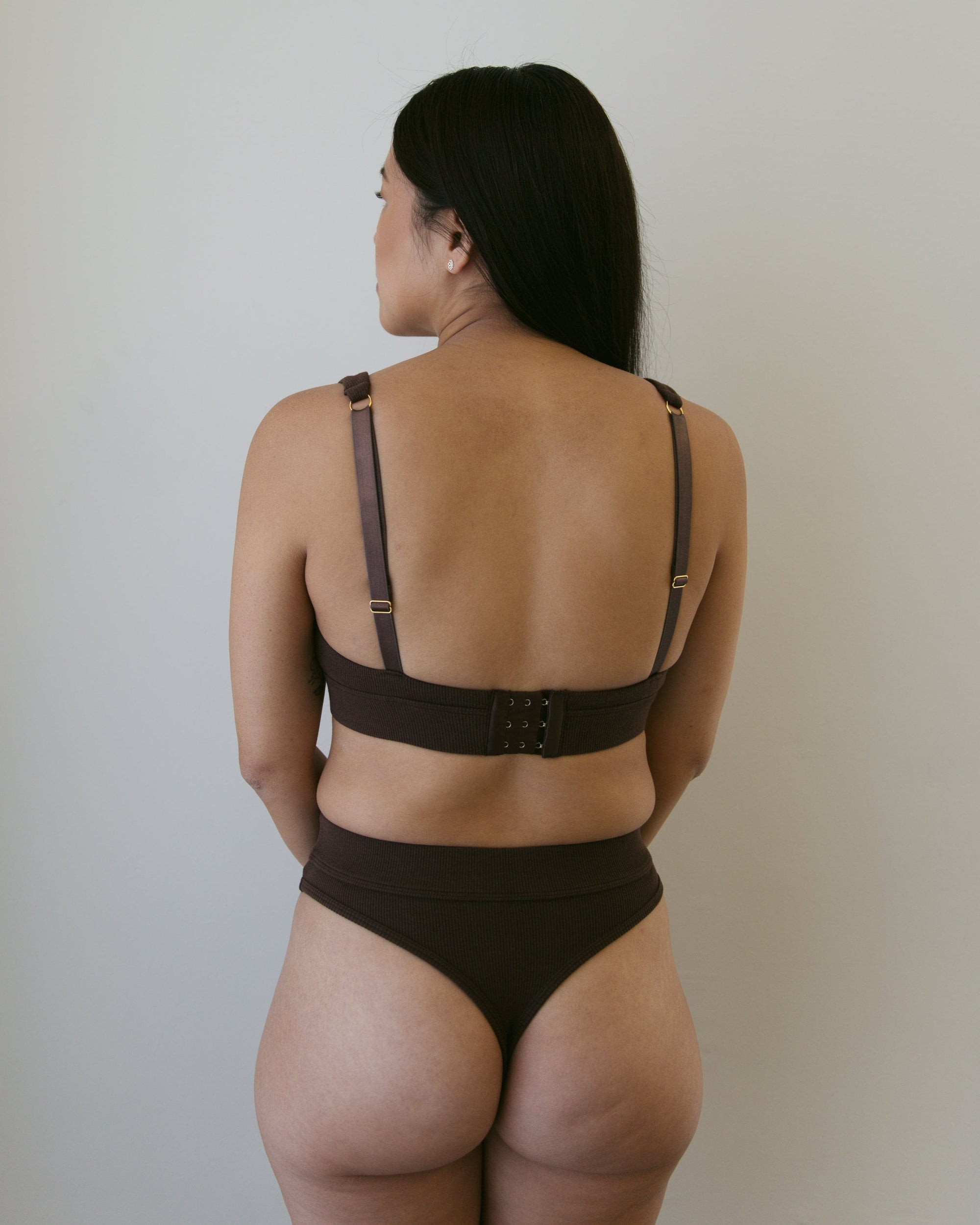 Phe is modelling our wire less coffee rear view plunge bra set including thong which co pliments the look and feel